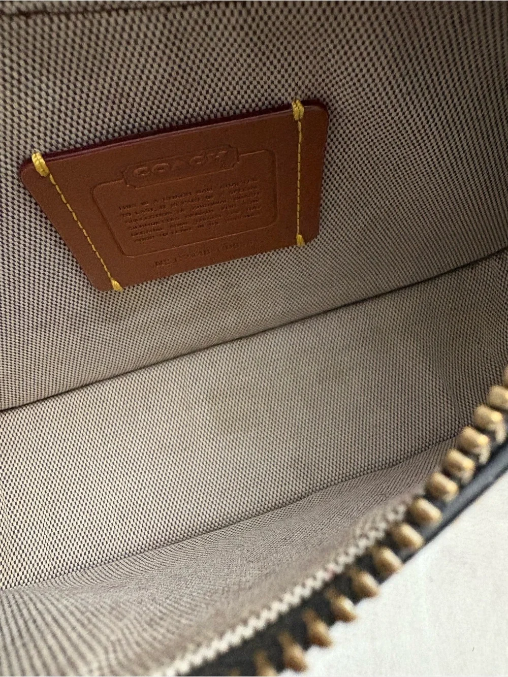 Coach Black Swinger Glove-Tanned Leather Crossbody Bag.